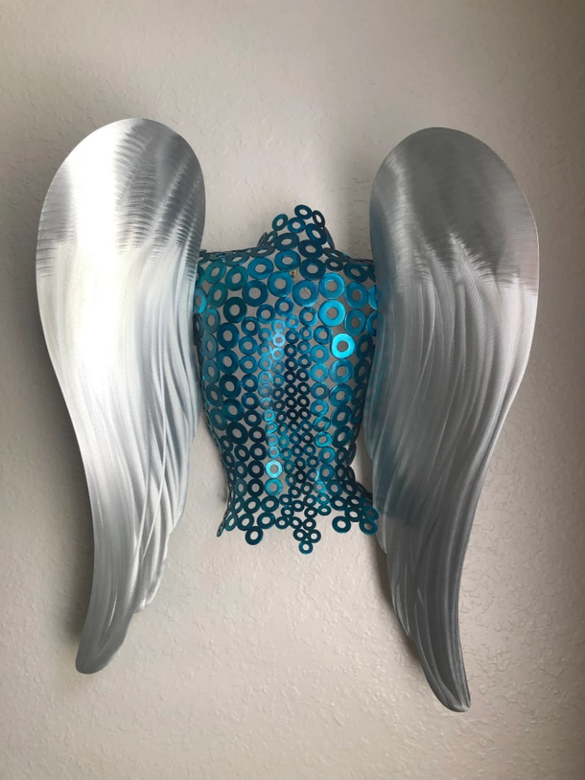 Teal Metal Angel Torso Sculpture: Teal Metal Angel Torso Sculpture This Handmade beautiful Teal Angel with silver wings was first formed and welded then it was ground and brushed and then a paint was applied and cured and then a clear