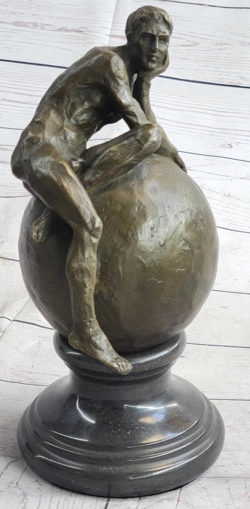 Original Nude Male Resting On A Globe Bronze Sculpture- 11" x 7": Original Nude Male Resting On A Globe Bronze Sculpture- 11" x 7" This amazing sculpture art piece of a male sitting on top of the world the way he came to it, nude. As he holds his head up wit