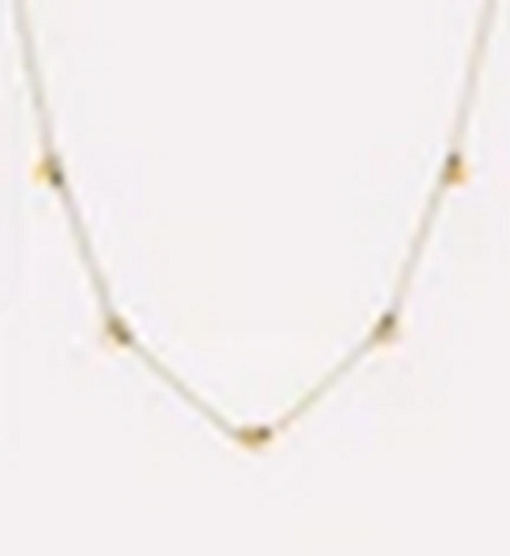 14K Gold Puffed Heart Stationed Necklace: 14K Gold Puffed Heart Stationed Necklace This 14K gold plated necklace features polished puffed hearts evenly spaced along a delicate chain, creating a charming and elegant design. Inspired by the pop