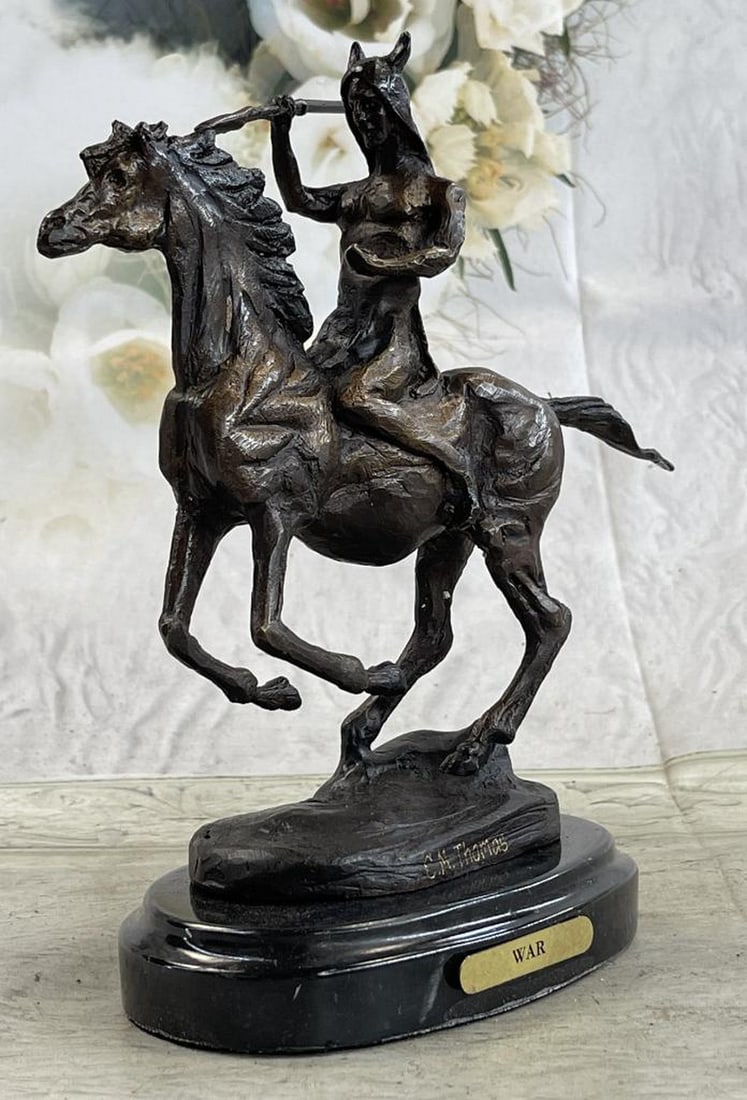 Western Horse Back Rider Bronze Sculpture: Western Horse Back Rider Bronze Sculpture This is a very interesting sculpture of a Native American chief. He sits on his trusted horse and wanders the land, holding a gun and prepared for any potenti