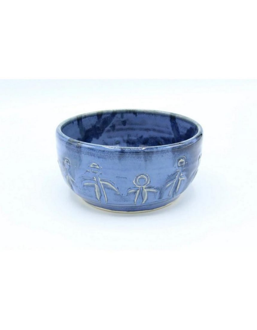 Blue Ceramic Small Friendship Bowl: Blue Ceramic Small Friendship Bowl The Friendship Bowl is a gift that nurtures the soul. Crafted to honor the tradition of sharing meals with loved ones, the circle of friends depicted on the bowl