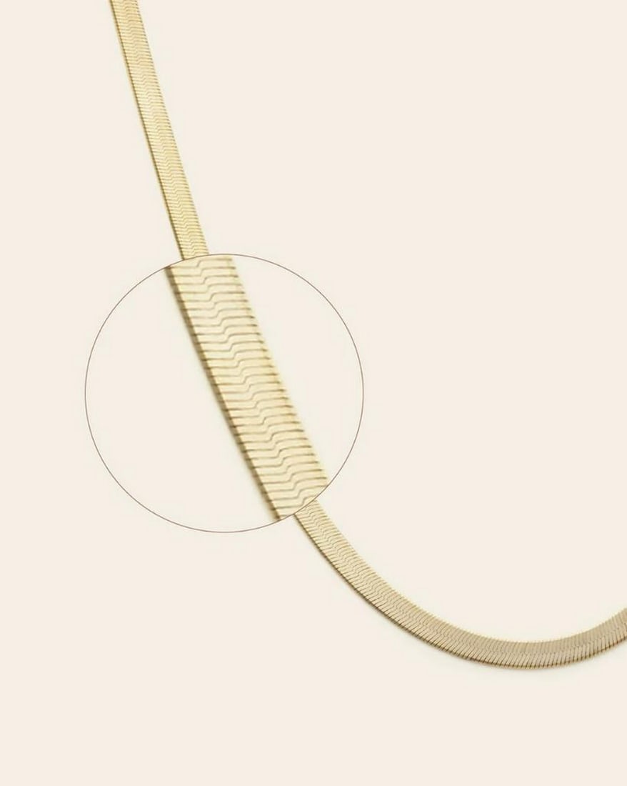 14k Vermeil Gold Plated Herringbone Chain: 14k Vermeil Gold Plated Herringbone Chain This 14k Vermeil Gold Plated Herringbone Chain showcases a sleek and sophisticated design. Crafted with precision, its signature herringbone pattern lies flat
