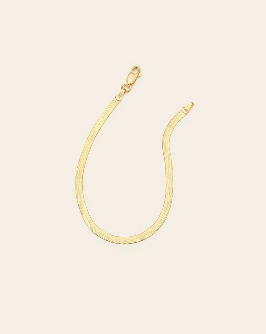 14k Vermeil Gold Plated Men's Herringbone Bracelet: 14k Vermeil Gold Plated Men's Herringbone Bracelet This 14K vermeil gold-plated men's herringbone bracelet combines sleek sophistication with timeless style. Featuring a distinctive, flat