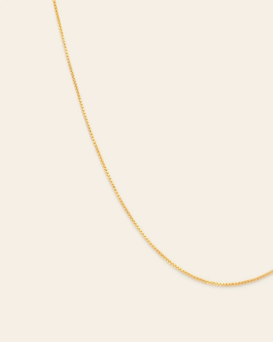 14k Vermeil Gold Plated Women's Box Chain: 14k Vermeil Gold Plated Women's Box Chain The 14K vermeil gold-plated box chain is a minimalist classic with timeless appeal. Its geometric, square-link design offers a sleek and modern look,
