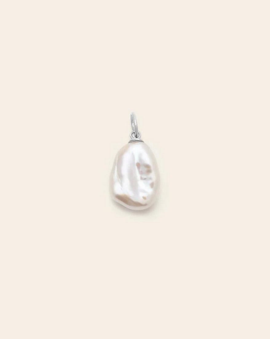 Sterling Silver Medium Baroque Pearl Pendant: Sterling Silver Medium Baroque Pearl Pendant A symbol of prosperity and good fortune, this timeless freshwater pearl pendant is the perfect complement to your favorite chain or hoops. Crafted in sterl