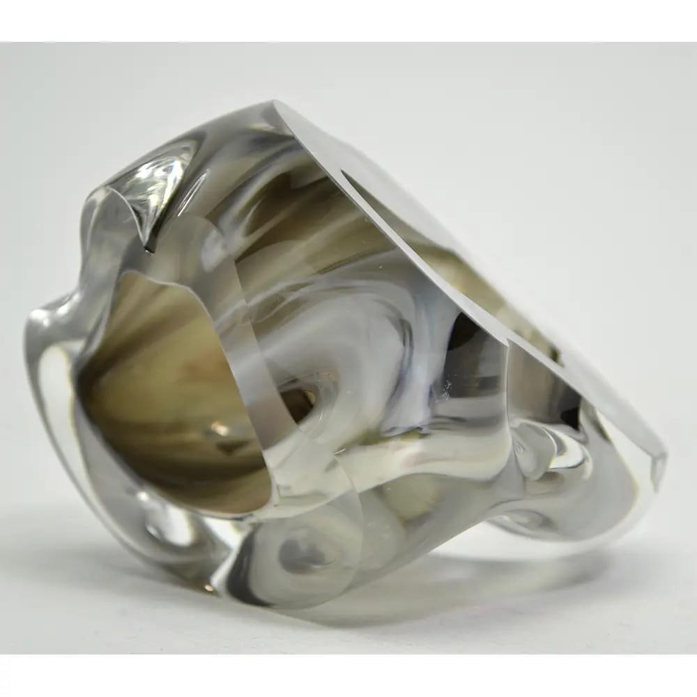 Metamorphosis' Glass Sculpture by Imogen Davis: 'Metamorphosis' Glass Sculpture by Imogen Davis This sculpture symbolizes the transformation within a chrysalis, featuring two contrasting facets. Viewed from different angles, it reveals