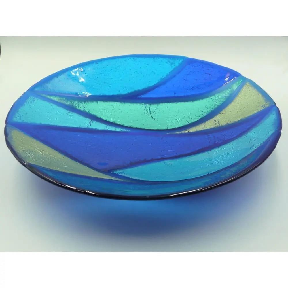 Silver Waves Decorative Blue Bowl by Myra Wishart: Silver Waves Decorative Blue Bowl by Myra Wishart Silver leaves are carefully layered inside this decorative blue bowl, interwoven between individually cut glass pieces and fired multiple times. The s