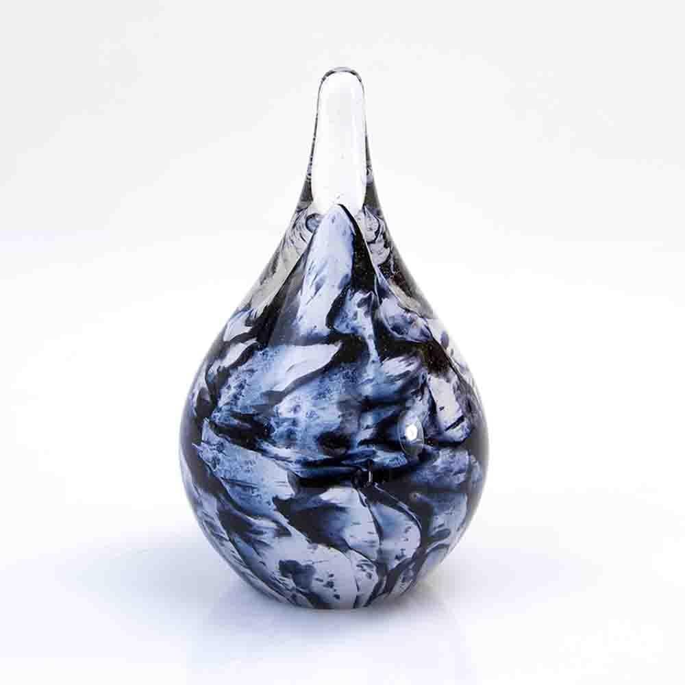 Mini Urn ‘Droplet’ by Loranto Glass: Mini Urn ‘Droplet’ by Loranto Glass This mini glass urn features a droplet shape with a monochrome finish, designed to hold a small portion of ashes. The base disc provides secure access to the co