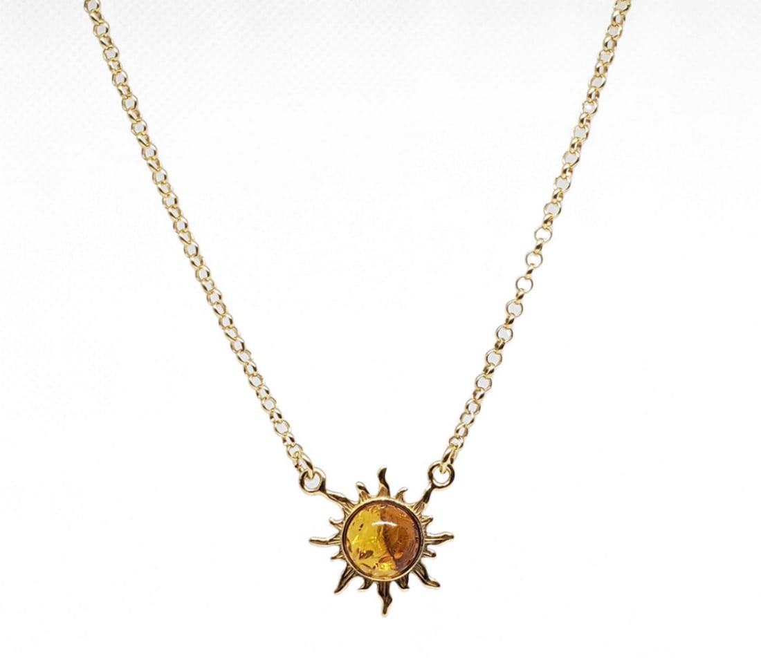 Sterling Silver Gold Plated Radiant Golden Sun Necklace: Sterling Silver Gold Plated Radiant Golden Sun Necklace The focal point of the necklace is the sunburst pendant, meticulously crafted from sterling silver and plated with radiant gold for an added tou