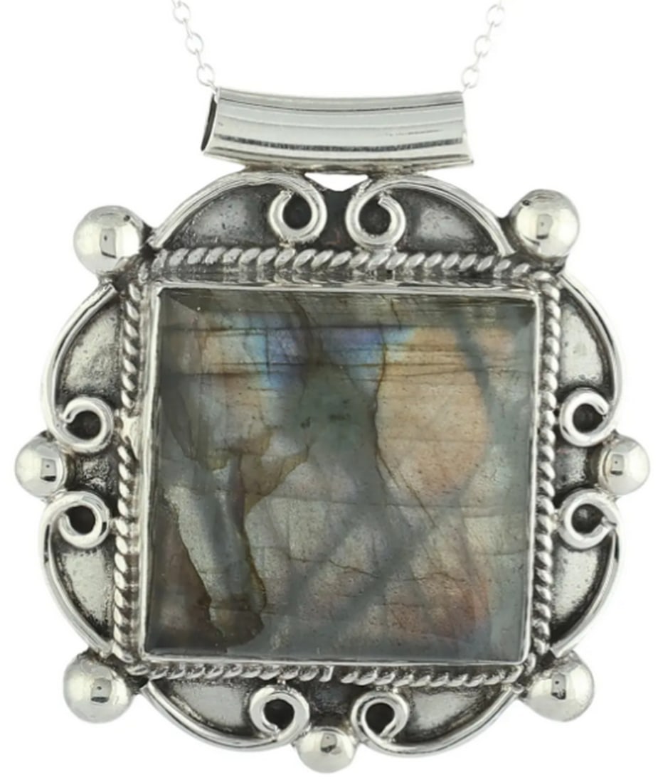 Labradorite Moonlight Pendant: Labradorite Moonlight Pendant Embrace the enchanting beauty of the aurora borealis with this stunning labradorite pendant. The carefully selected gemstone showcases vibrant flashes of blue, green,