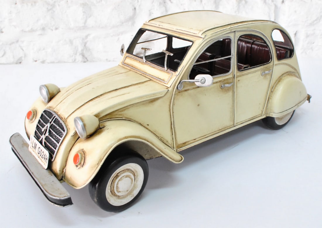 Rustic Citroën 2CV Model Car - Beige & Black Die Cast Metal Decor: Rustic Citroën 2CV Model Car - Beige & Black Die Cast Metal Decor Decorate any table, desk, or shelf with vintage charm using our Rustic Citroën 2CV Sculpture. Featuring a detailed die-cast meta