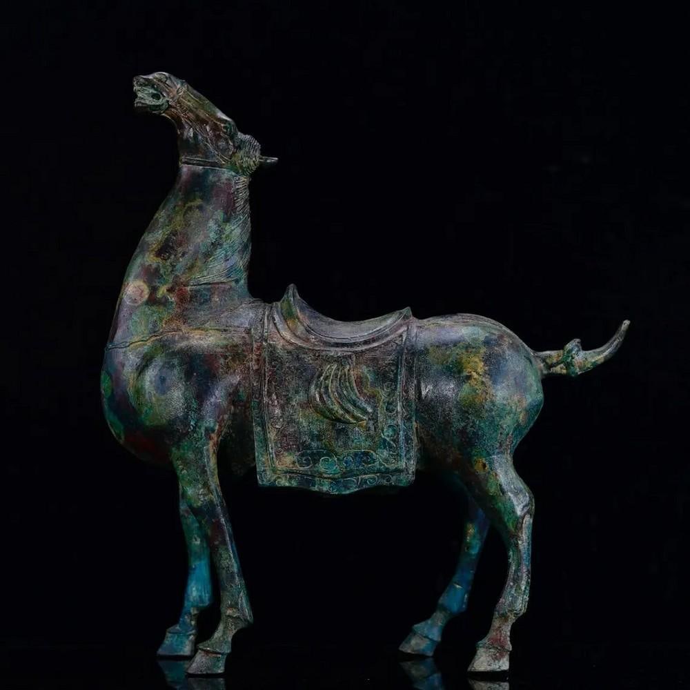 Antique Bronze Horse Statue: Antique Bronze Horse Statue This elegant Chinese antique features a hand-crafted bronze horse, showcasing exquisite detailing and refined artistry. Representing strength, grace, and perseverance in