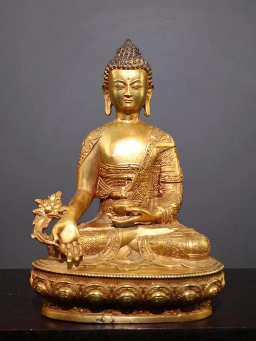 Antique Chinese Copper Sakyamuni Medicine Buddha Statue: Antique Chinese Copper Sakyamuni Medicine Buddha Statue A rare and meticulously handcrafted Sakyamuni Medicine Buddha statue, made from pure copper with intricate detailing. Representing healing and e