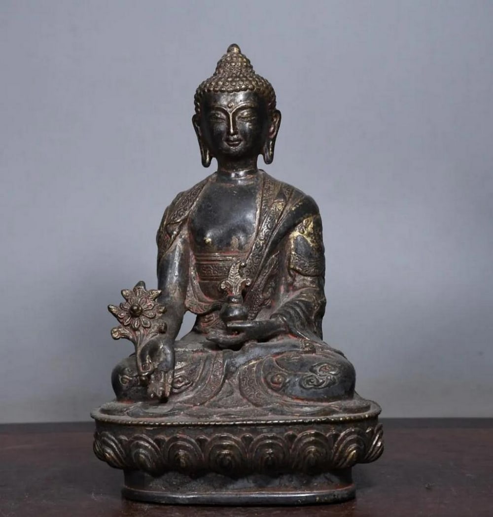 Antique Chinese Copper Medicine Buddha & Three Treasures Statue: Antique Chinese Copper Medicine Buddha & Three Treasures Statue A rare and masterfully handcrafted Medicine Buddha statue, made from pure copper with intricate detailing. Representing the Three Tr