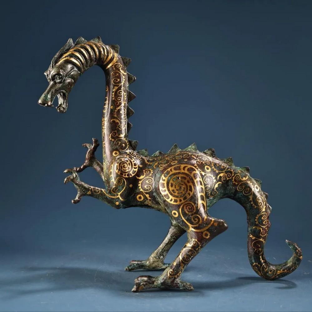 Exquisite Handmade Bronze Dragon Beast Statue – Chinese Antique Ornament: Exquisite Handmade Bronze Dragon Beast Statue – Chinese Antique Ornament This powerful and intricately handcrafted bronze statue depicts a mythical dragon beast, a revered creature in Chinese cultur