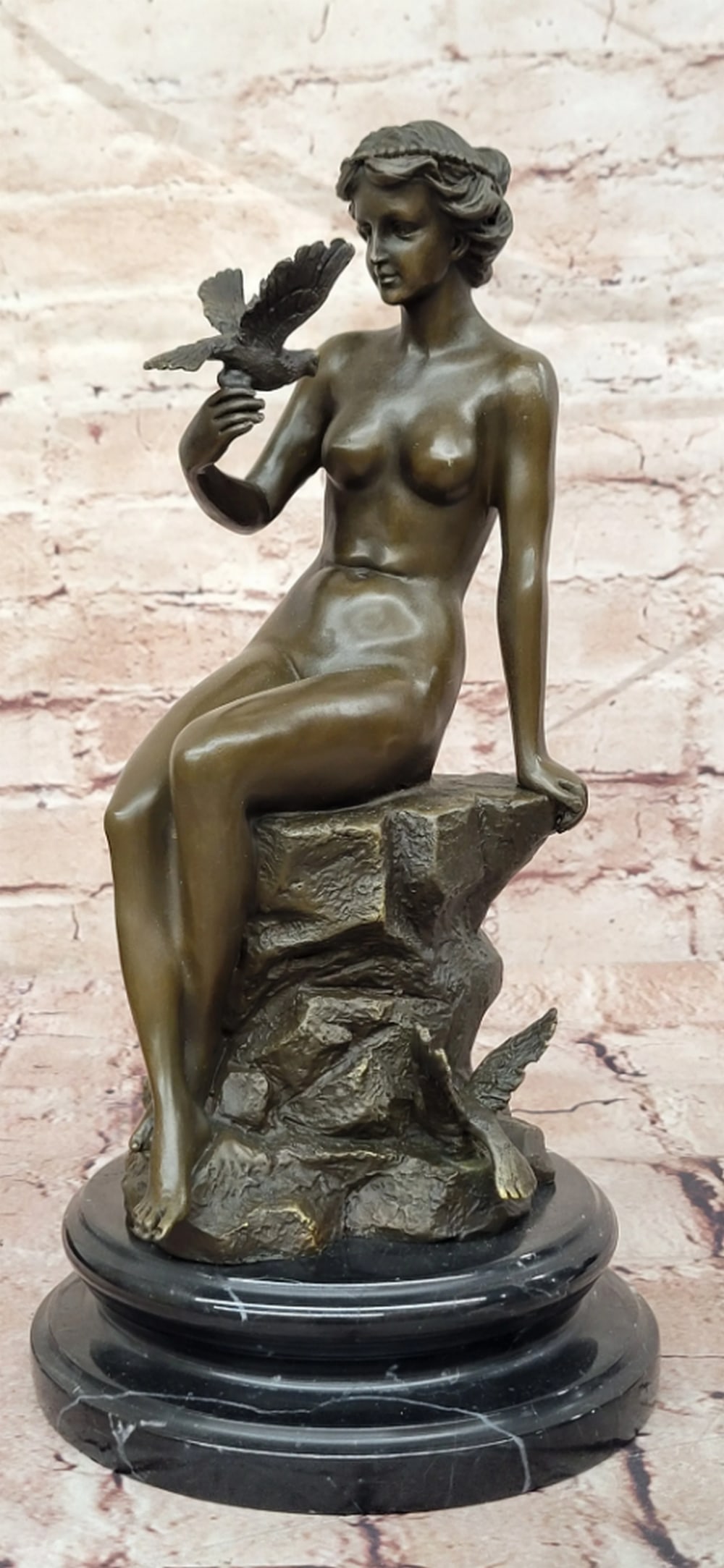 Preiss Bronze Sculpture of Seated Lady with Birds - 12.5" x 6": Preiss Bronze Sculpture of Seated Lady with Birds - 12.5" x 6" This bronze sculpture by Preiss depicts a seated female figure accompanied by birds in a tranquil, contemplative composition. The