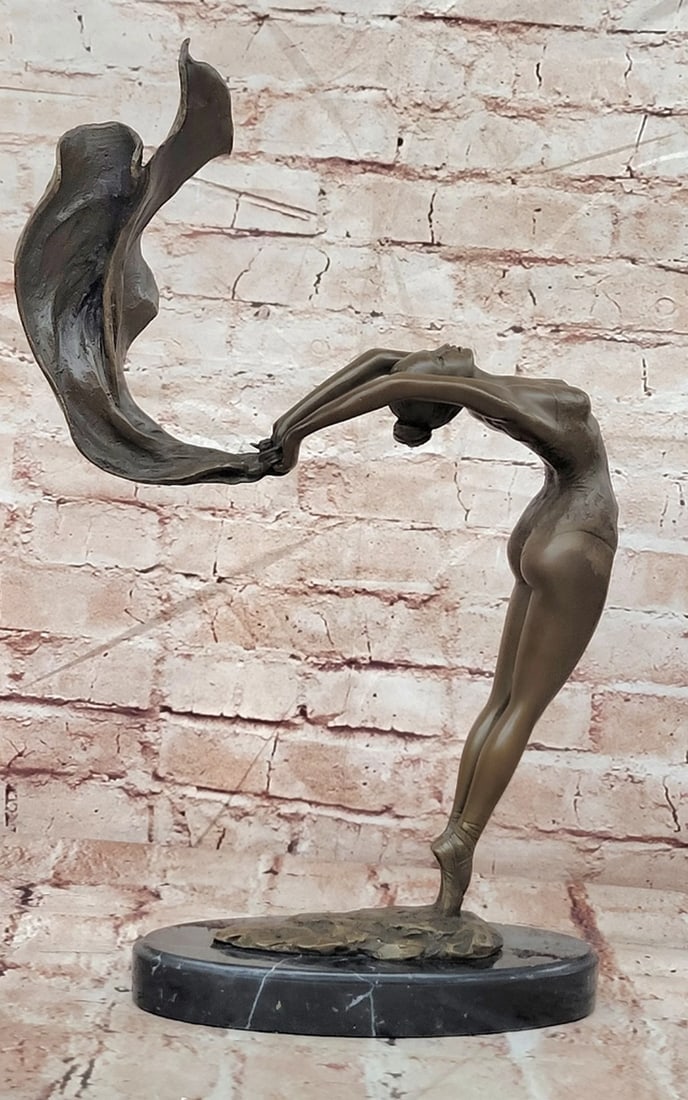 Mavchi Bronze Ballet Dancer Sculpture with Flowing Voile - 16" x 11": Mavchi Bronze Ballet Dancer Sculpture with Flowing Voile - 16" x 11" This original bronze sculpture by Mavchi depicts a graceful ballet dancer adorned with flowing voile. Captured in an elegan