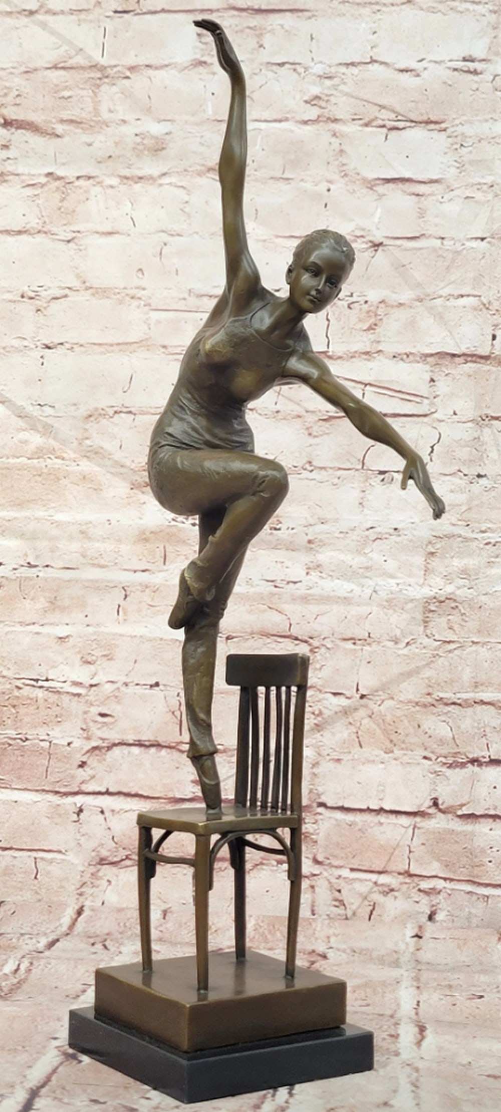 Jean Patoue Bronze Modern Dancer on Chair Sculpture - 19.5" x 10.5": Jean Patoue Bronze Modern Dancer on Chair Sculpture - 19.5" x 10.5" This original bronze sculpture by Jean Patoue depicts a modern dancer standing gracefully upon a chair. The composition capt