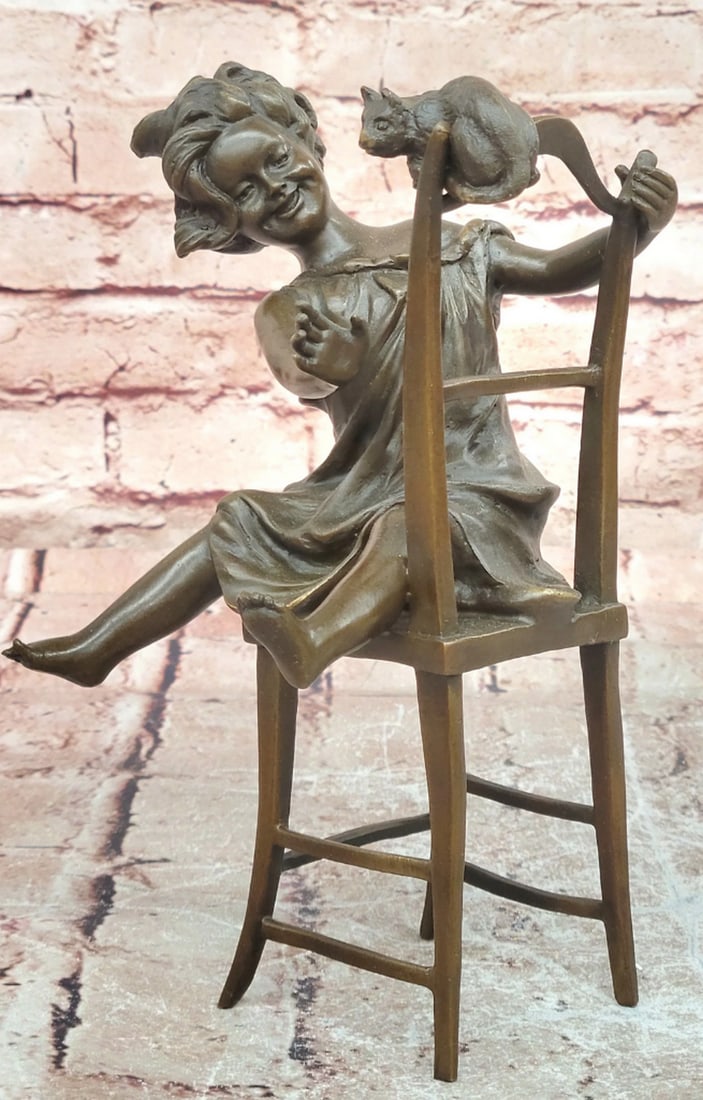 Franz Iffland “Jolie Cat?? Bronze Sculpture - 9" x 6": Franz Iffland “Jolie Cat” Bronze Sculpture - 9" x 6" This bronze sculpture titled “Jolie Cat” depicts a young girl interacting with a cat in a calm and intimate moment. The com