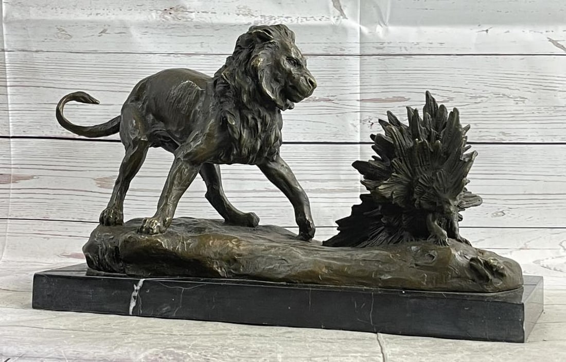 Signed Milo Original Lion vs. Porcupine Bronze Sculpture on Marble Base - 10" x 16": Signed Milo Original Lion vs. Porcupine Bronze Sculpture on Marble Base - 10" x 16" Witness the gripping encounter between a powerful lion and a resilient porcupine in this extraordinary bronz