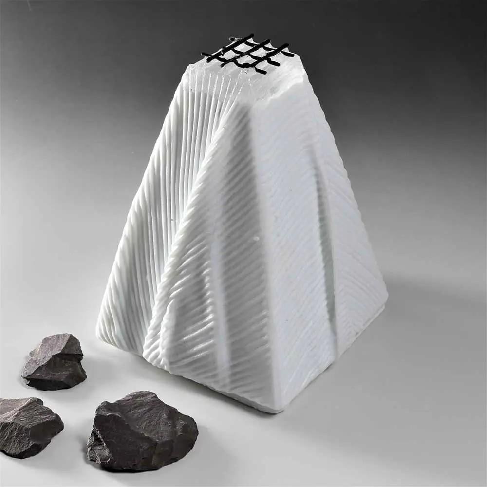 Barred Within' Cast Glass Sculpture by Deborah Timperley: 'Barred Within' Cast Glass Sculpture by Deborah Timperley This elegant white cast glass sculpture takes the form of a four-sided pyramid, its sharp geometric shape softened by the folds and tw