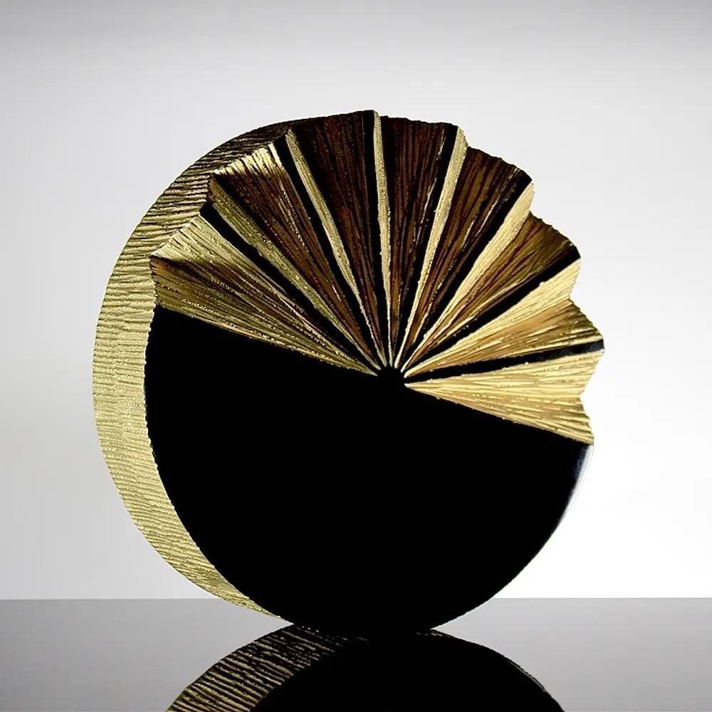 Sunset into the Black Sea' Golden Glass Sculpture: 'Sunset into the Black Sea' Golden Glass Sculpture Jan Falta's Sunset in the Black Sea is a stunning example of golden glass art, where the fusion of gold and black glass creates a strikin