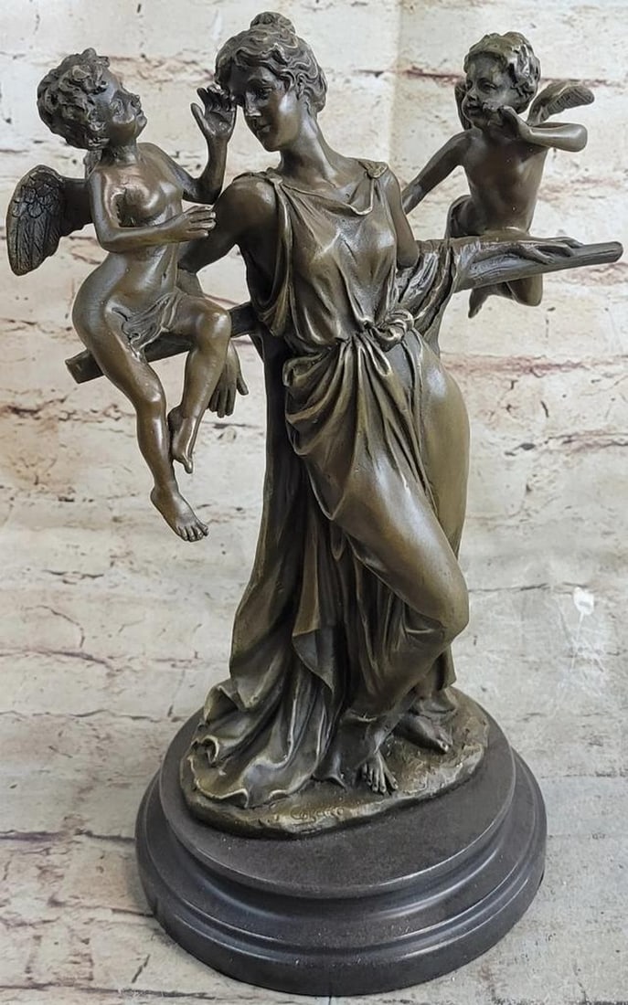 Mother & Cherub Children Bronze Sculpture - 13" x 9": Mother & Cherub Children Bronze Sculpture - 13" x 9" This delightful piece depicts a woman standing by a tree branch with two cherubs flying next to her. She holds her hands up to branch a
