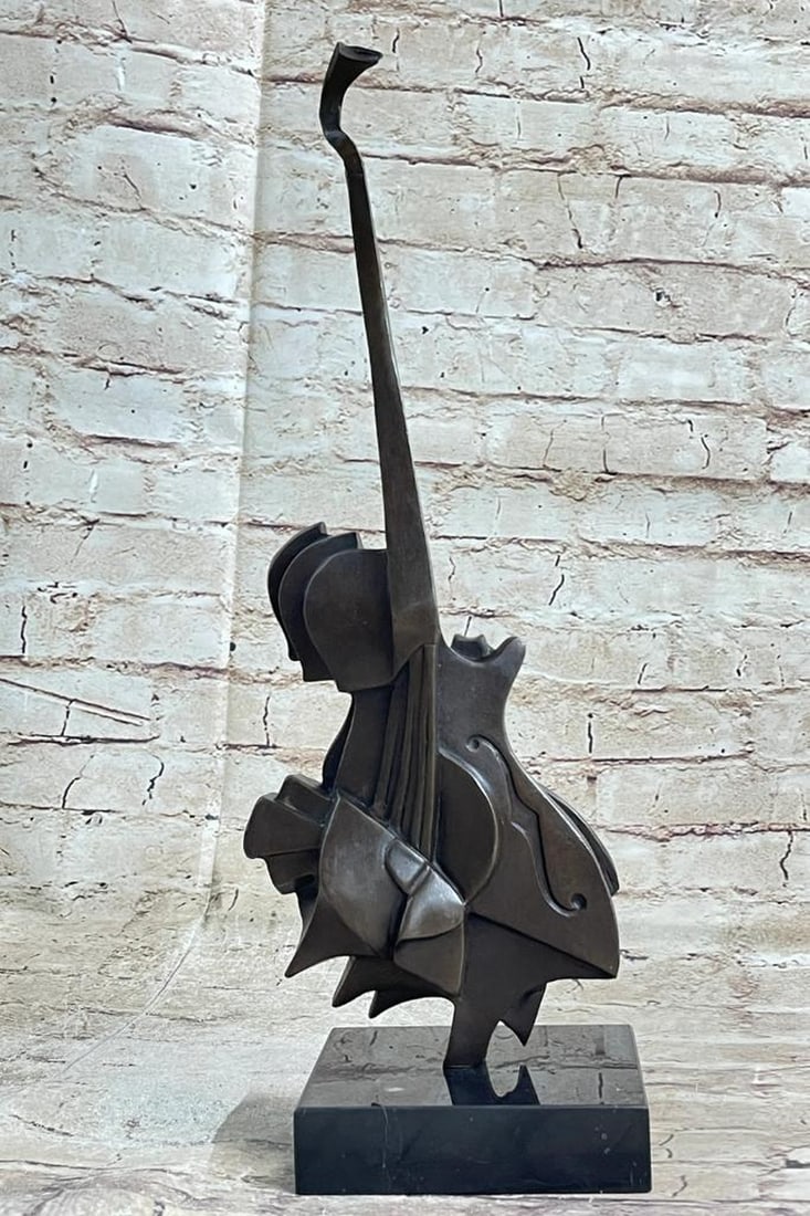 Abstract Surrealist Inspired Bronze Guitar Art - 17" x 6": Abstract Surrealist Inspired Bronze Guitar Art - 17" x 6" Salvador Dalí's Avant-Garde Guitar Sculpture represents a groundbreaking shift in sculpture, transitioning from traditional model