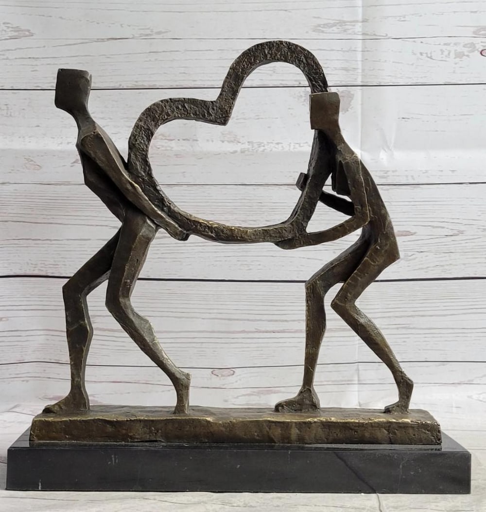 Signed Francisi Original Lovers Carrying Heart Bronze Sculpture: Signed Francisci Original Lovers Carrying Heart Bronze Sculpture This exquisite bronze sculpture captures the essence of love and togetherness with its depiction of an elegant and slender