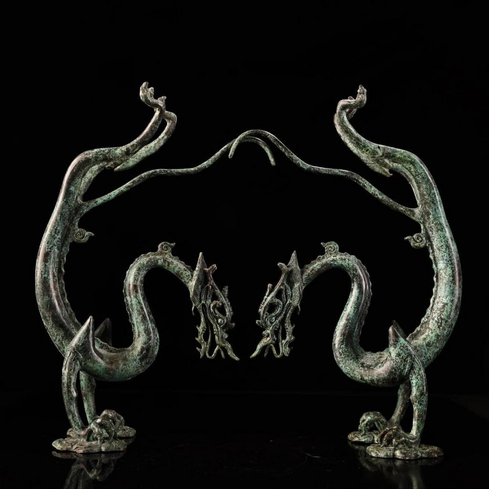 Handcrafted Chinese Bronze Inverted Dragon Statue: Handcrafted Chinese Bronze Inverted Dragon Statue This exquisite antique bronze statue depicts an inverted dragon, a powerful symbol in Chinese culture representing transformation, strength, and spiri