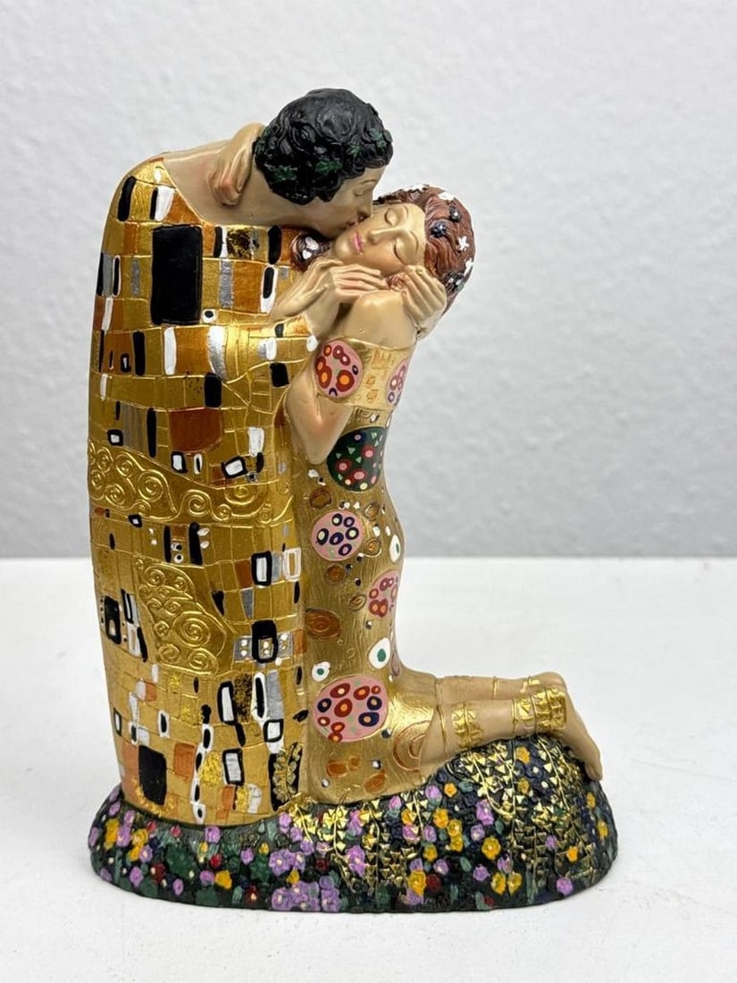 The Kiss - Klimt's Inspired Lovers Sculpture: The Kiss - Klimt's Inspired Lovers Sculpture Drawing inspiration from Gustav Klimt's iconic 1908 masterpiece The Kiss, this sculpture transforms the romance and richness of the Vienna Secession into a