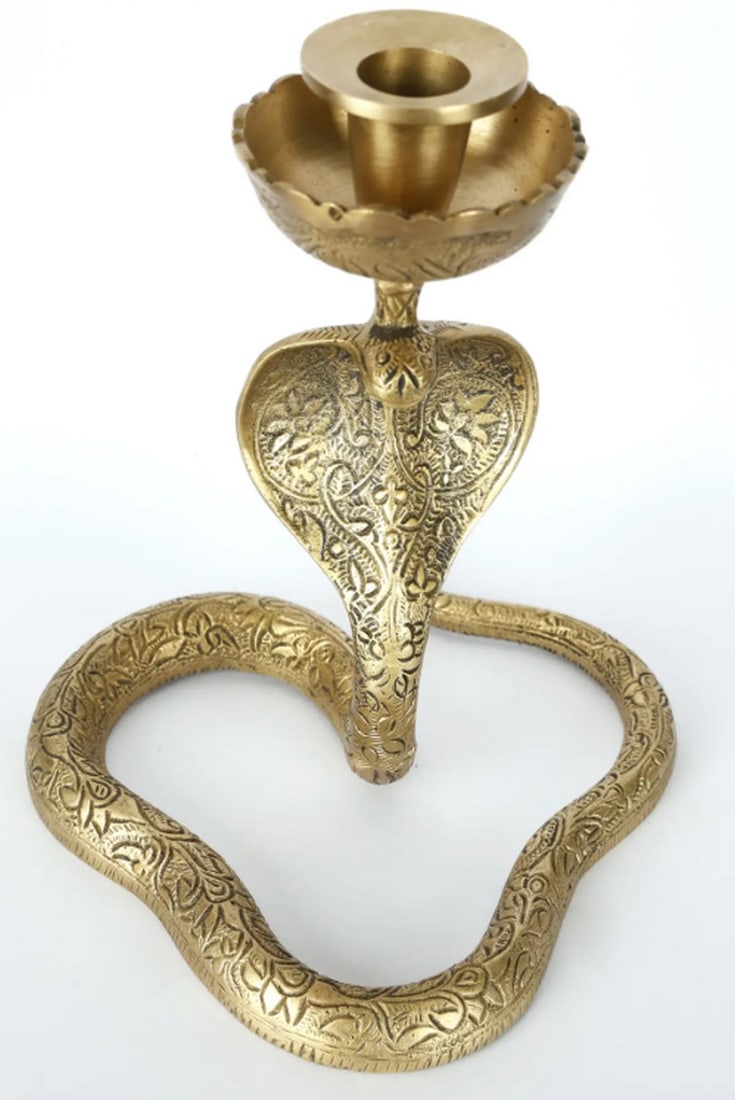 Brass Snake Candle Holder - 8'': Brass Snake Candle Holder - 8" An 8-inch brass candle holder designed in the form of a coiled snake. The piece features smooth curves and a compact form, suitable for tabletop display. Handmade us