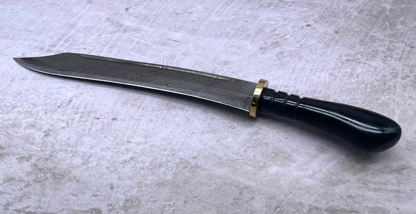 13 1/2" Ebonized Blade Handle Damascus Bowie Blade With Stitched Leather Sheath: 13 1/2" Ebonized Blade Handle Damascus Bowie Blade With Stitched Leather Sheath. An Excellent Hand Crafted Shive To Add To Any Collection. High Quality steel is utilized to forge the finest produc