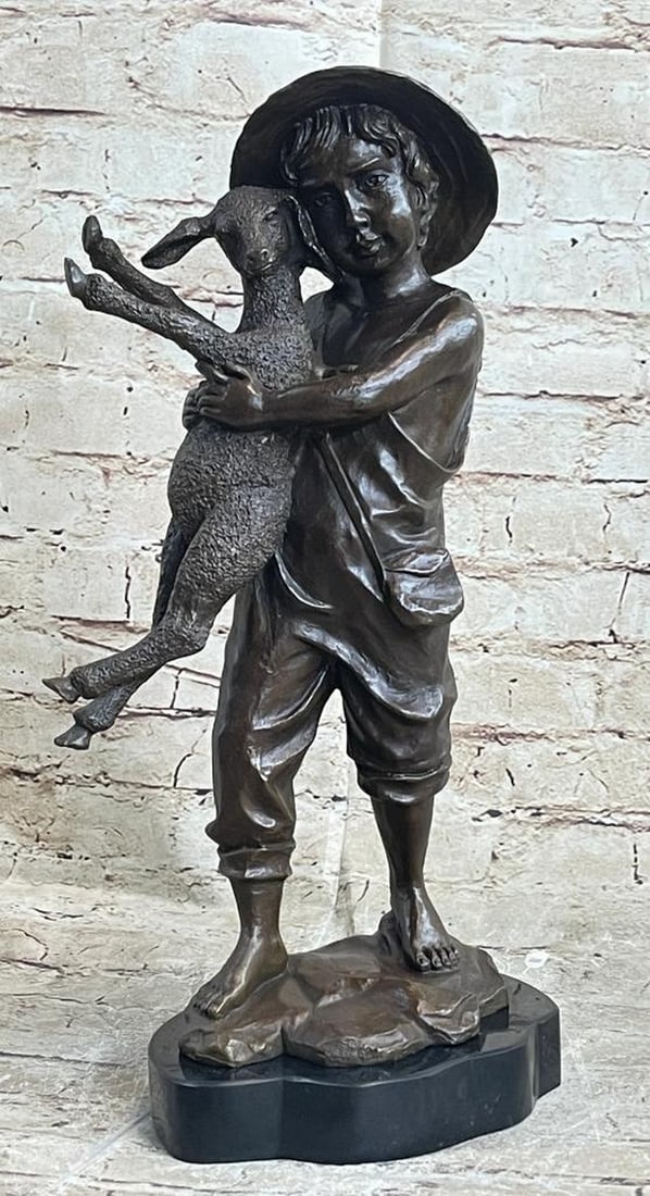 Little Boy Holding Lamb Original Bronze Statue - 15" x 7": Little Boy Holding Lamb Original Bronze Statue - 15" x 7" Embrace the rustic charm of the Young Farm Boy & His Sheep bronze statue, a timeless tribute to rural life and innocence. Meticulo
