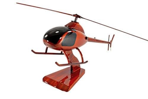 Rotorway Helicopter: Rotorway Helicopter The classic Rotorway helicopter is remarkably replicated in this handcrafted mahogany scale model. Moving rotors, high gloss finish and rich wood grain make this Rotorway a great