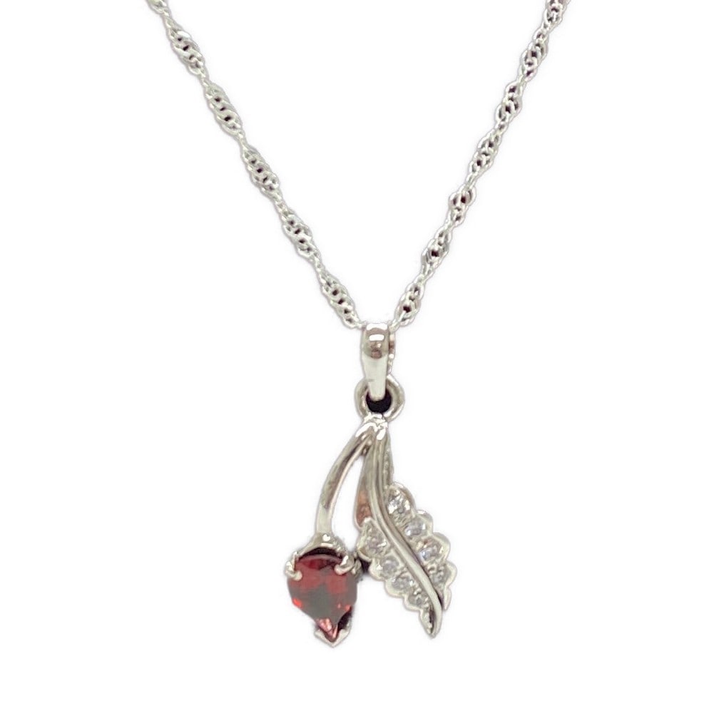 Lovely Leafling Garnet and Austrian Crystal 92.5 Purity Sterling Silver Pendant and Chain: Lovely Leafling Garnet and Austrian Crystal 92.5 Purity Sterling Silver Pendant and Chain A beautiful pear shaped Garnet accompanied by a stunning Austrian Crystal filled Leaf set in 92.5 purity