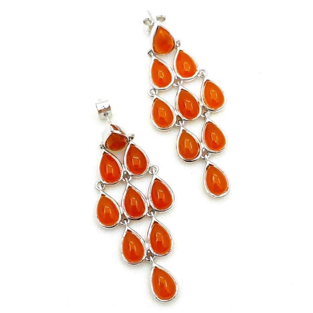 Orange Carnelian Cabochon Pear Grate Earrings: Orange Carnelian Cabochon Pear Grate Earrings These unique 925 Sterling Silver earrings have 9 beautiful orange carnelian cabochon gems on each one, arranged in a diamond pattern. View Photos For