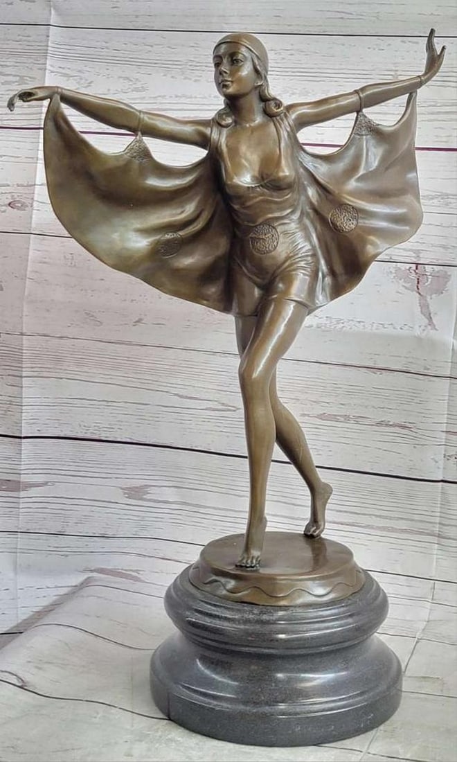 Bat Dancer Bronze Sculpture in the Manner of Otto Poertzel - 18'' x 12'': Bat Dancer Bronze Sculpture in the Manner of Otto Poertzel - 18" x 12" This bronze sculpture depicts a young woman standing on high arched feet, wearing a bat-wing style dress with arms outstr