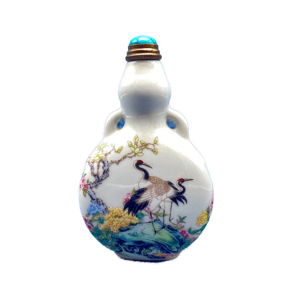 EXQUISITE CHINESE HANDMADE PORCELAIN AND TURQUOISE SNUFF BOTTLE: Exquisite Chinese Handmade Porcelain And Turquoise Snuff Bottle Beautifully handmade Chinese Porcelain and Turquoise snuff bottle. Reign Signed on the bottom. View photos for further details.
