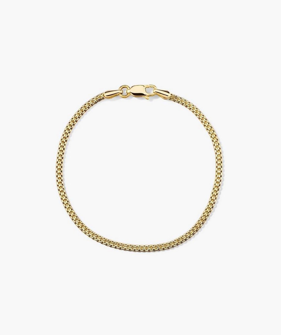 14k Yellow Gold Sleek Chain Bracelet: 14k Yellow Gold Sleek Chain Bracelet A sleek and timeless chain bracelet crafted in 14k yellow gold. Its polished, hollowed links provide a refined look that’s perfect for everyday wear or layering