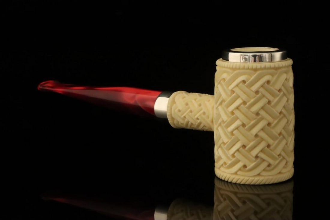Deluxe Carved Poker Block Meerschaum Pipe with Fitted Case: Deluxe Carved Poker Block Meerschaum Pipe with Fitted Case This premium block meerschaum pipe features a carved poker shape with detailed craftsmanship and a smooth finish. The pipe is exceptionally
