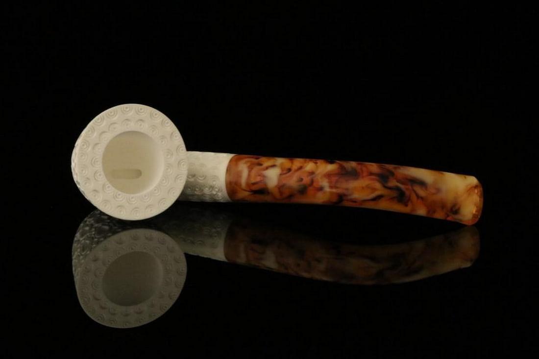 Lattice-Carved Dublin Block Meerschaum Pipe with Fitted Case: Lattice-Carved Dublin Block Meerschaum Pipe with Fitted Case This block meerschaum pipe features a traditional Dublin shape with a lattice-carved exterior. The textured surface adds visual detail whil