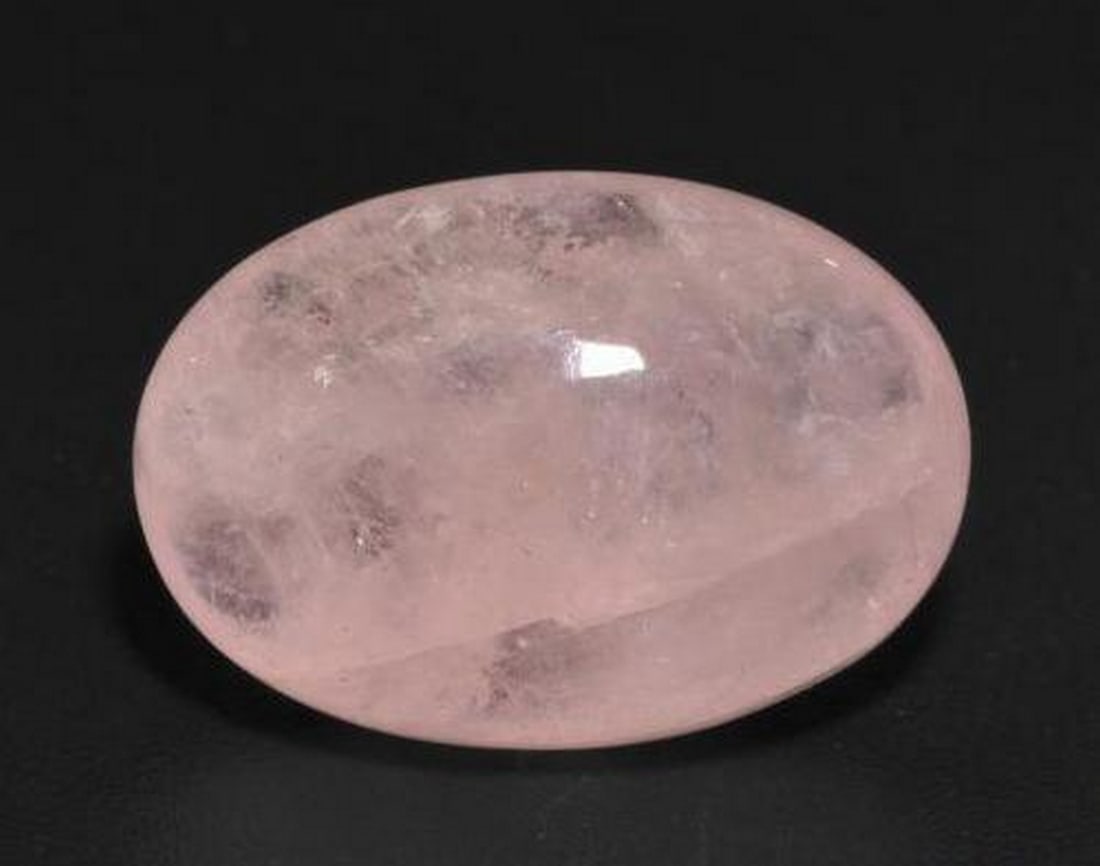 11.21ct Natural Medium Pink Morganite, Oval, Translucent: 11.21ct Natural Medium Pink Morganite, Oval, Translucent A natural morganite weighing 11.21 carats, cut in an oval cabochon shape with a soft medium pink hue and translucent clarity. Measuring 17.46 x