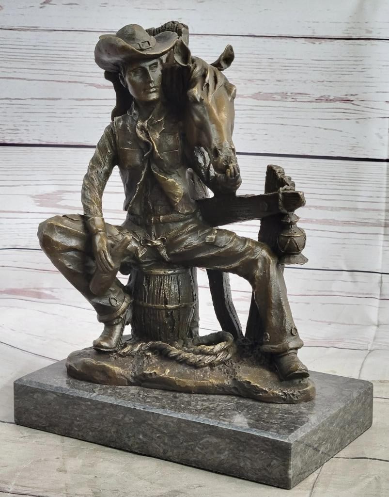 Cowboy & Horse Sitting Having a Drink Bronze Statue Sculpture Country Western: The Trusted Companions in this sculpture, a cowboy and his horse, are eager and ready to ride the trail together. this bronze figures are standing on rocky soil with a lucky Horseshoe . Cowboy has cha