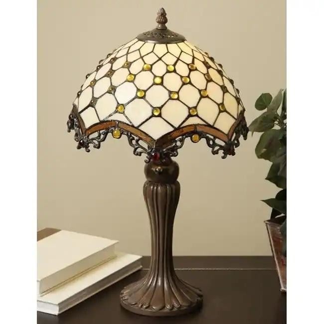 Tiffany-Style Roman Jewel Table Lamp: Tiffany-Style Roman Jewel Table Lamp Elevate your space with the Tiffany-Style Roman Jewel Table Lamp. Featuring a handcrafted stained glass shade with intricate jewel accents, this elegant lamp casts