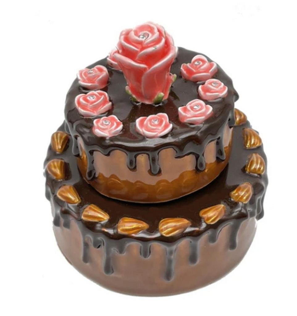 Musical Brown Birthday Cake Box Playing 'Happy Birthday': Musical Brown Birthday Cake Box Playing Happy Birthday A delightful Enamel Painted Trinket Box, adorned with Austrian Crystals and plated with 24K gold, resembling a Brown Birthday Cake. Each crystal 