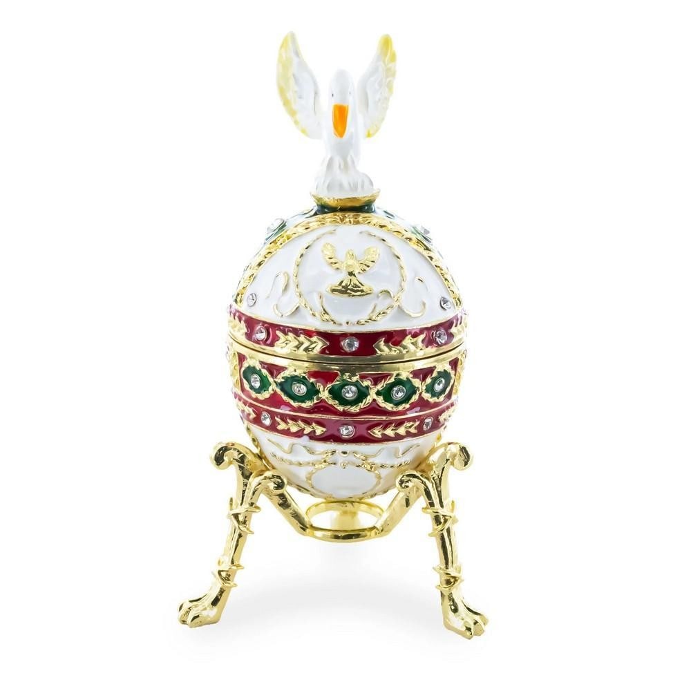 1898 Pelican Royal Imperial Inspired Easter Egg: 1898 Pelican Royal Imperial Inspired Easter Egg This exquisite hand-painted pink Easter egg is crafted from gold-plated pewter and adorned with high-polished enamel and delicate golden trim. Designed