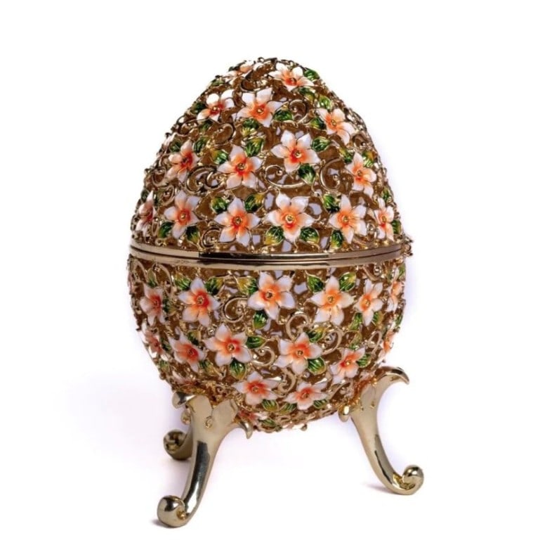 Faberge Egg Decorated with Flowers: Faberge Egg Decorated with Flowers Enamel Painted Trinket Box Decorated with Austrian Crystals Dimensions: H 6.61 x W 4.01 x L 4.01 in inches View Photos For Further Details.