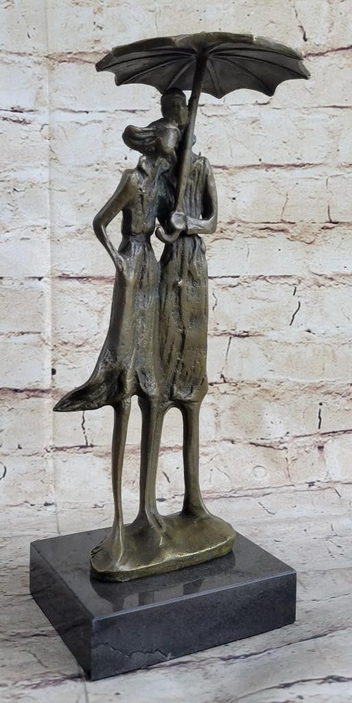 'Lovers in the Rain'' Original Bronze Statue - 12'' x 6'': x34 Lovers in the Rainx34 Original Bronze Statue - 12x34 x 6x34 Capture the essence of romance with this captivating bronze sculpture of two lovers sharing an umbrella. Their intimacy and connection a