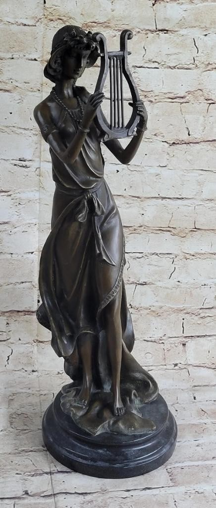 Elegant Bronze Harpist Statue Original by J. Patoue - 19'' x 6.5'': Elegant Bronze Harpist Statue Original by J. Patoue - 19x34 x 6.5x34 This stunning bronze statue features a graceful young woman elegantly posed with a harp, mounted on a stylish pedestal. Crafted fro